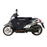 Coprigambe Termoscud®, un coprigambe impermeabile con fodera termica. Su scooter. Di TUCANO URBANO.